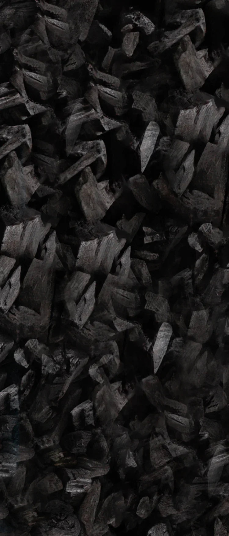 image of activated charcoal, a material with properties that remove impurities and toxins from the air. It also prevents the proliferation of bacteria, fungi, and mites. Part of the composition of the Coluna Relax cervical pillow